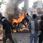 Protesters during clashes in north-east Delhi.