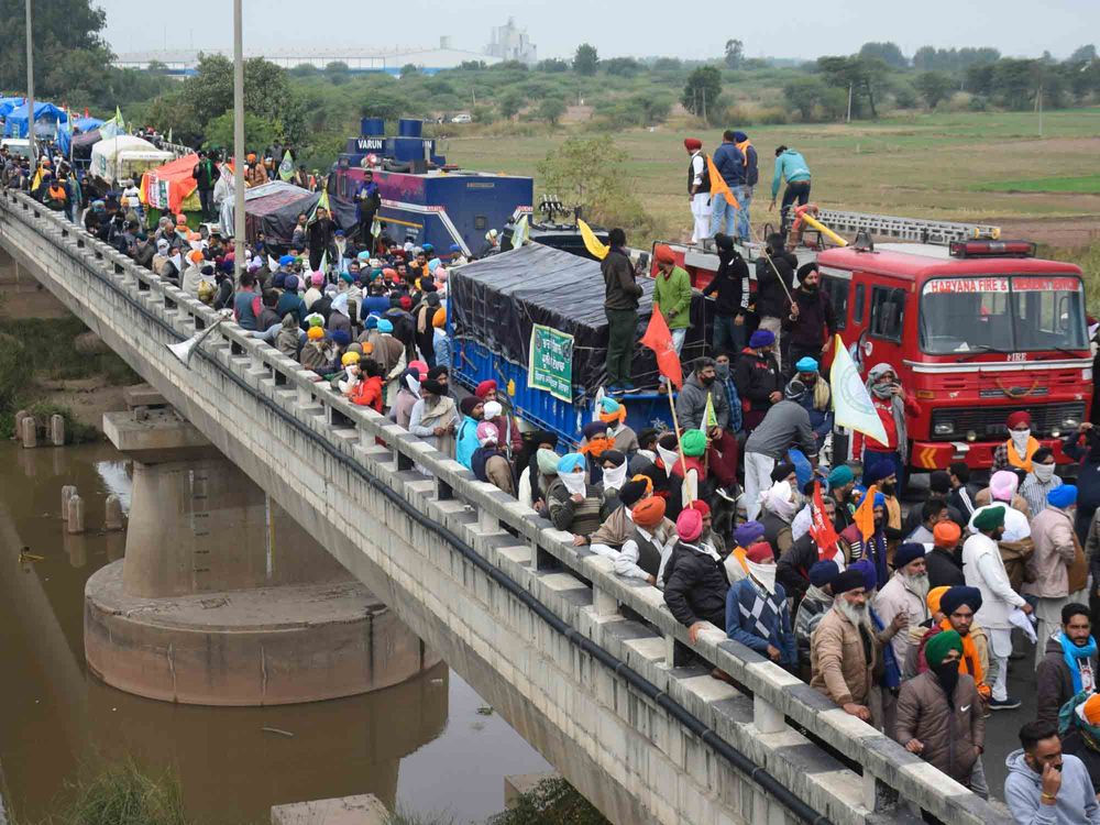 Farmers protesting against new agricultural laws march near Ambala, India, on Nov. 26.