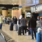 Travelers at the King Khalid International Airport in Riyadh.