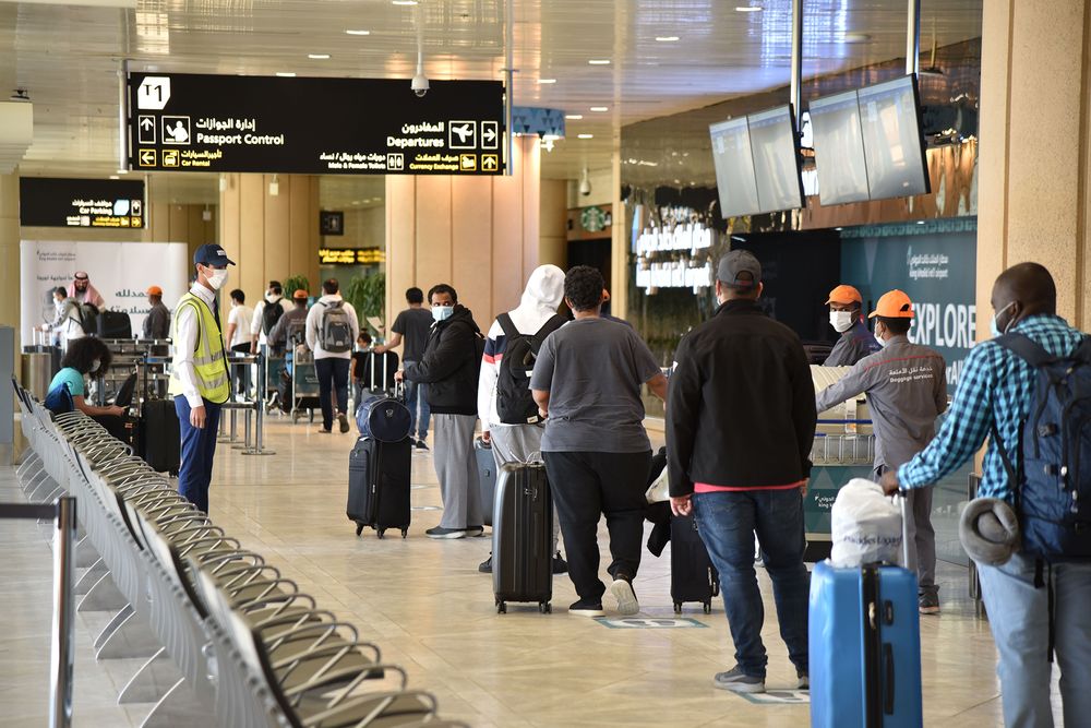 Travelers at the King Khalid International Airport in Riyadh.