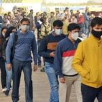 Crowd of passengers at the Arthla Metro Station after new travel guidelines were issued in the wake of of rise in COVID-19 cases, in Ghaziabad.