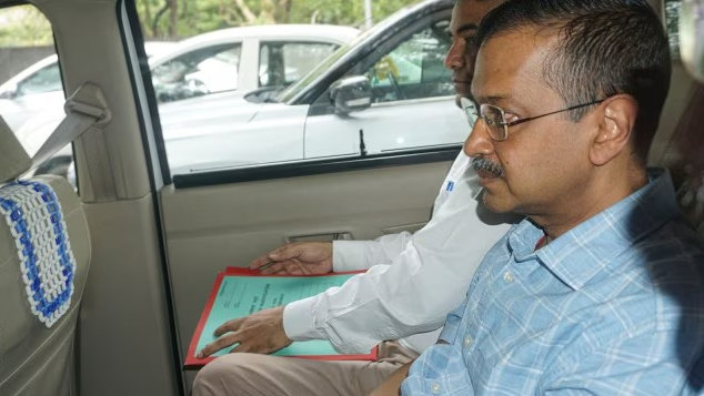 Delhi CM and AAP leader Arvind Kejriwal being brought to a court by CBI officials in connection with a money laundering case related to the Delhi liquor policy, in New Delhi, June 29, 2024.