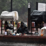 Heavy rain in Delhi causes waterlogging and traffic disruptions.
