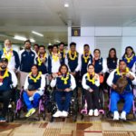 Paralympic athletes are welcomed home with flower petals and cheers at Delhi's airport after a successful Paris 2024 Games.