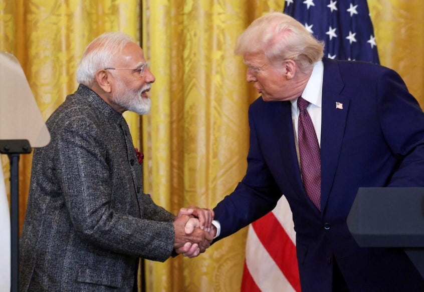 Donald Trump speaking during his Asia tour, discussing progress on a trade deal with India.