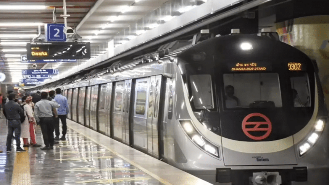 Delhi Metro train near a station, representing the announcement of Pitampura’s renaming to Madhuban Chowk