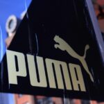 Puma logo on a store display as China’s Anta Sports buys a 29% stake in the German sportswear brand.
