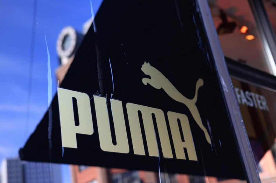 Puma logo on a store display as China’s Anta Sports buys a 29% stake in the German sportswear brand.