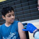 Child receiving MMR vaccine in South Carolina amid rising measles cases in the United States